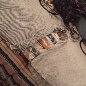 2 black an white striped shirts short sleeve